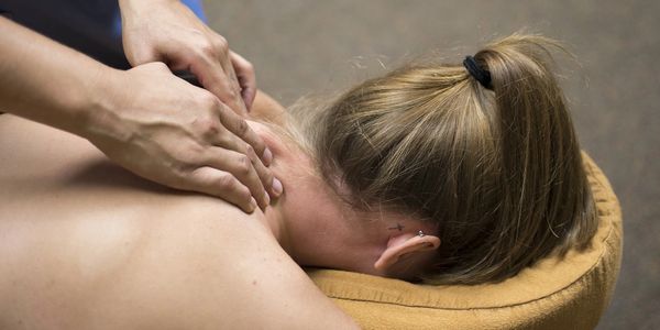 Female receiving Swedish body massage