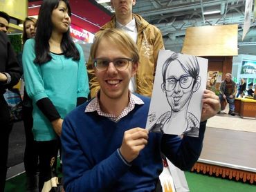 Live Caricature at ITB Berlin, Germany back in 2014 by Malaysia’s No.1 Caricature Artist Olylukis.