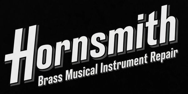 Hornsmith sign for brass musical instrument repair services.