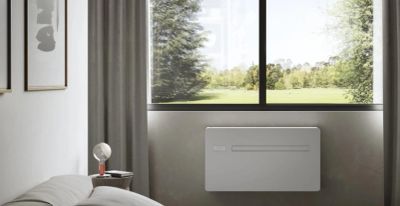 Modern room with a large window and heater.