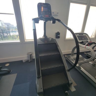 closeup shot of a treadmill in a room 