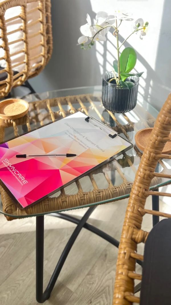A client consultation form laying on a table 