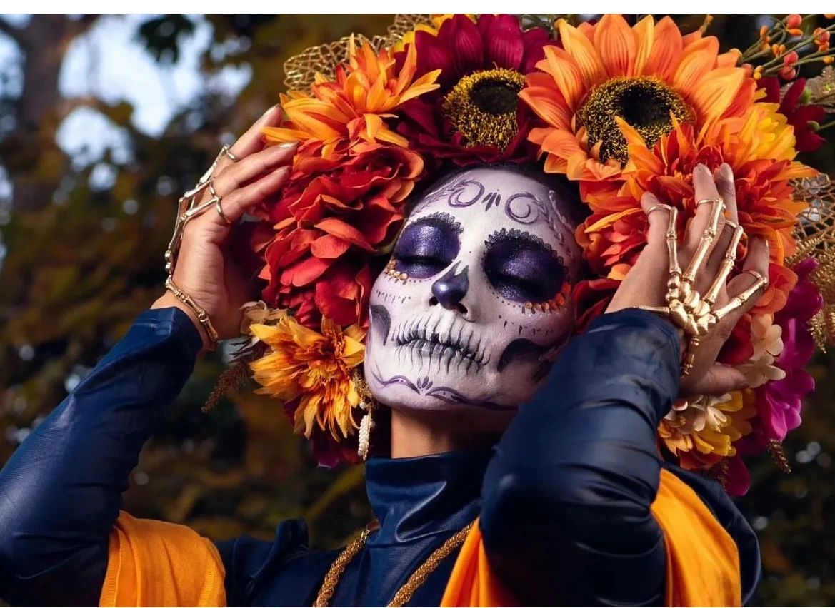 beautifully executed catrina with a vibrant floral crown, closeup.