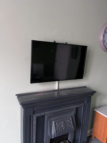 Tv above fireplace 