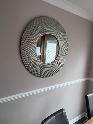 Large circular mirror installed 