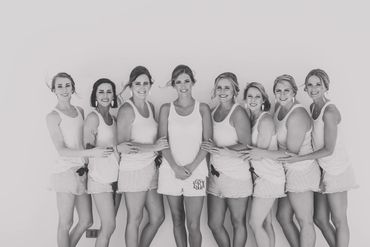 black and white bridal photo with bride in monogrammed shorts