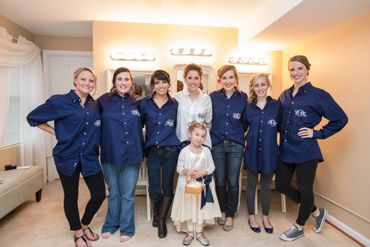 photo of bride and maids in collared monogrammed tops