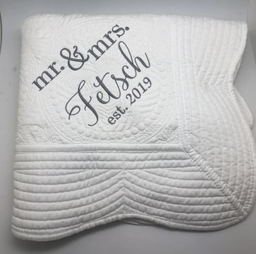 white fabric with mr and mrs monogrammed