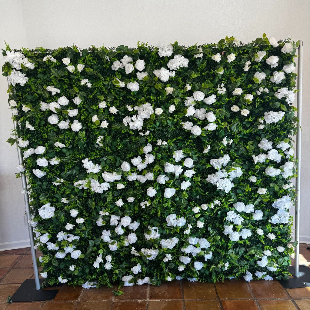 White and Green Flower Wall Rental 
8ft by 8ft white and green flower wall 
$250.00 Rental