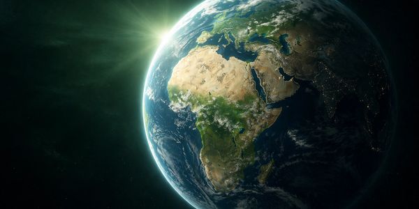Sunlit Earth showing Africa and parts of Europe and Asia from space.