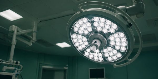 Bright surgical light inside an operating room.