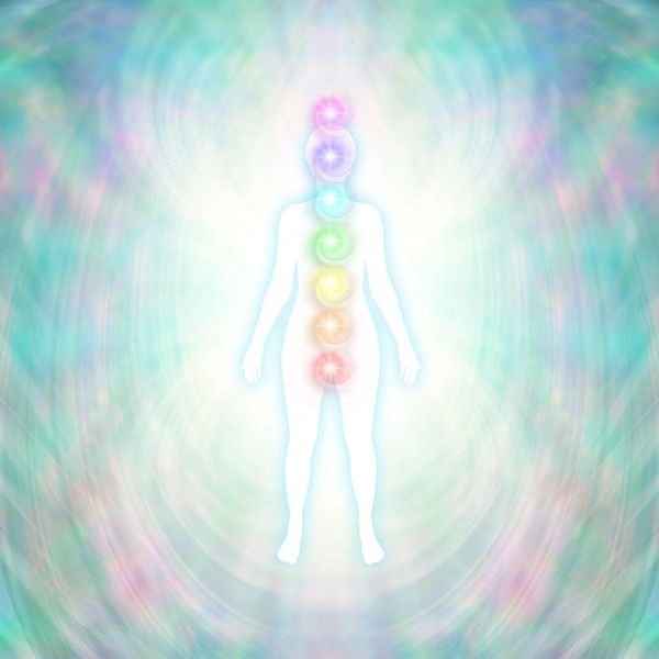 Abstract image of subtle energy body with many visible energy fields and the 7 chakras 