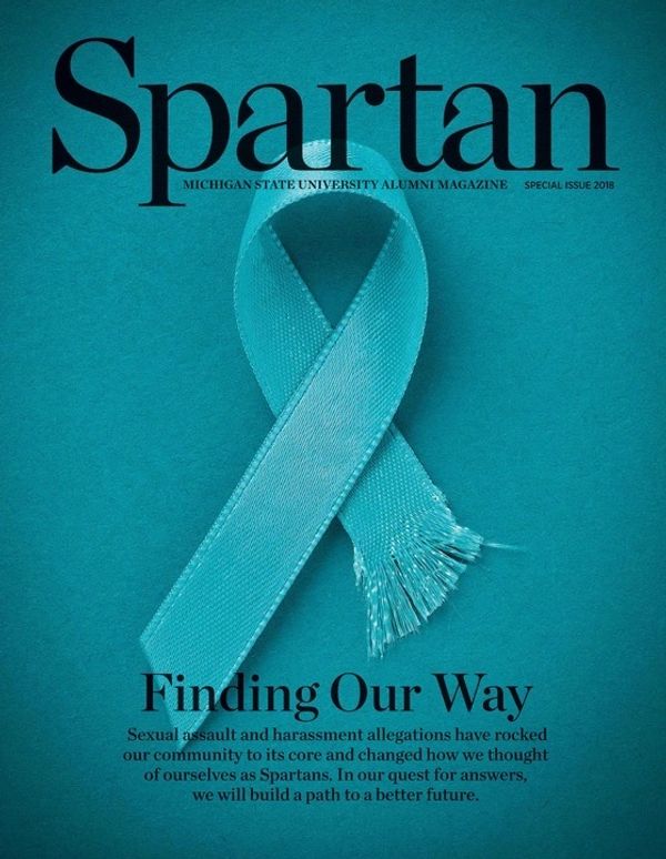 Cover of Spartan magazine highlighting sexual assault awareness with a teal ribbon.