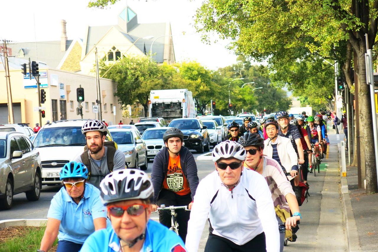 Adelaide commuters on the Frome Street protected bike lane. Adelaide commuters on the Frome Street protected bike lane.