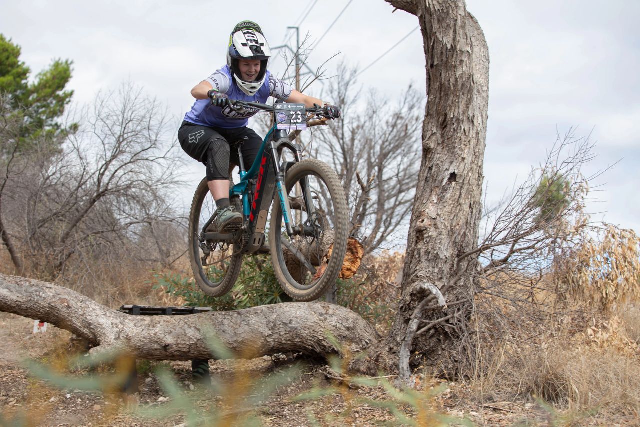 Gravity Girls founder Moira Love launching off a jump on Shapeshifter at O'Halloran Hill. Picture: Tanya Fielding