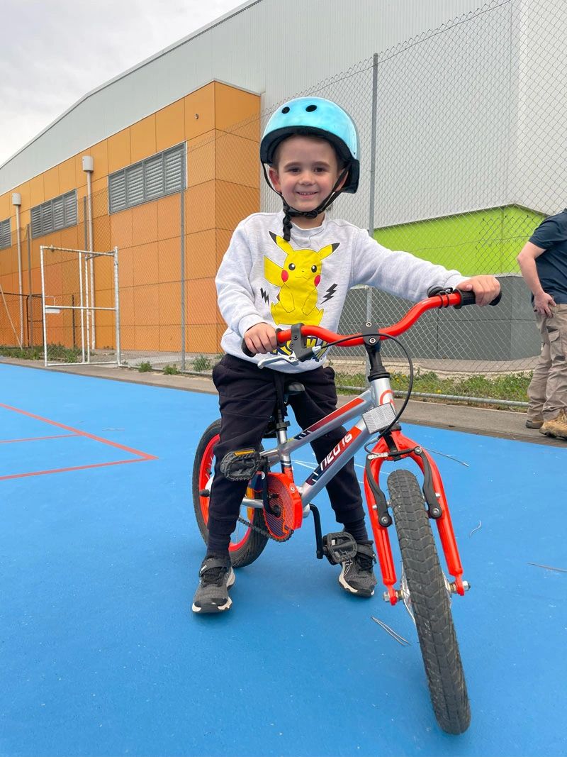 Tom proud of his brand new bike
