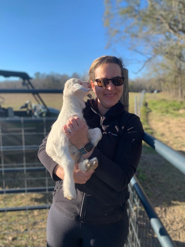 Carollynn with a goat