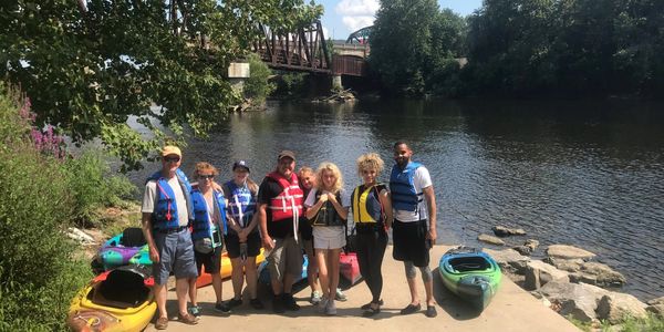 Kayakers put in at the Bethlehem River access point on Sand Island for a kayak and bike tour