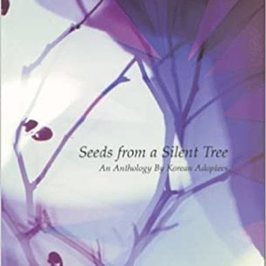 The image is of the book cover, which is lavender tinted and shows branches with seeds.