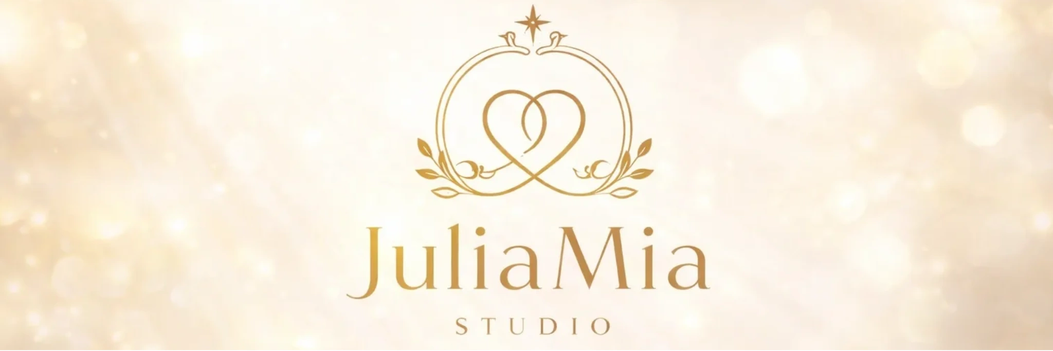 Elegant silver ring with a green gemstone and JuliaMia Studio logo.