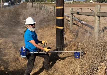 Dry weeds being cut from property line.  High weed cutting.
