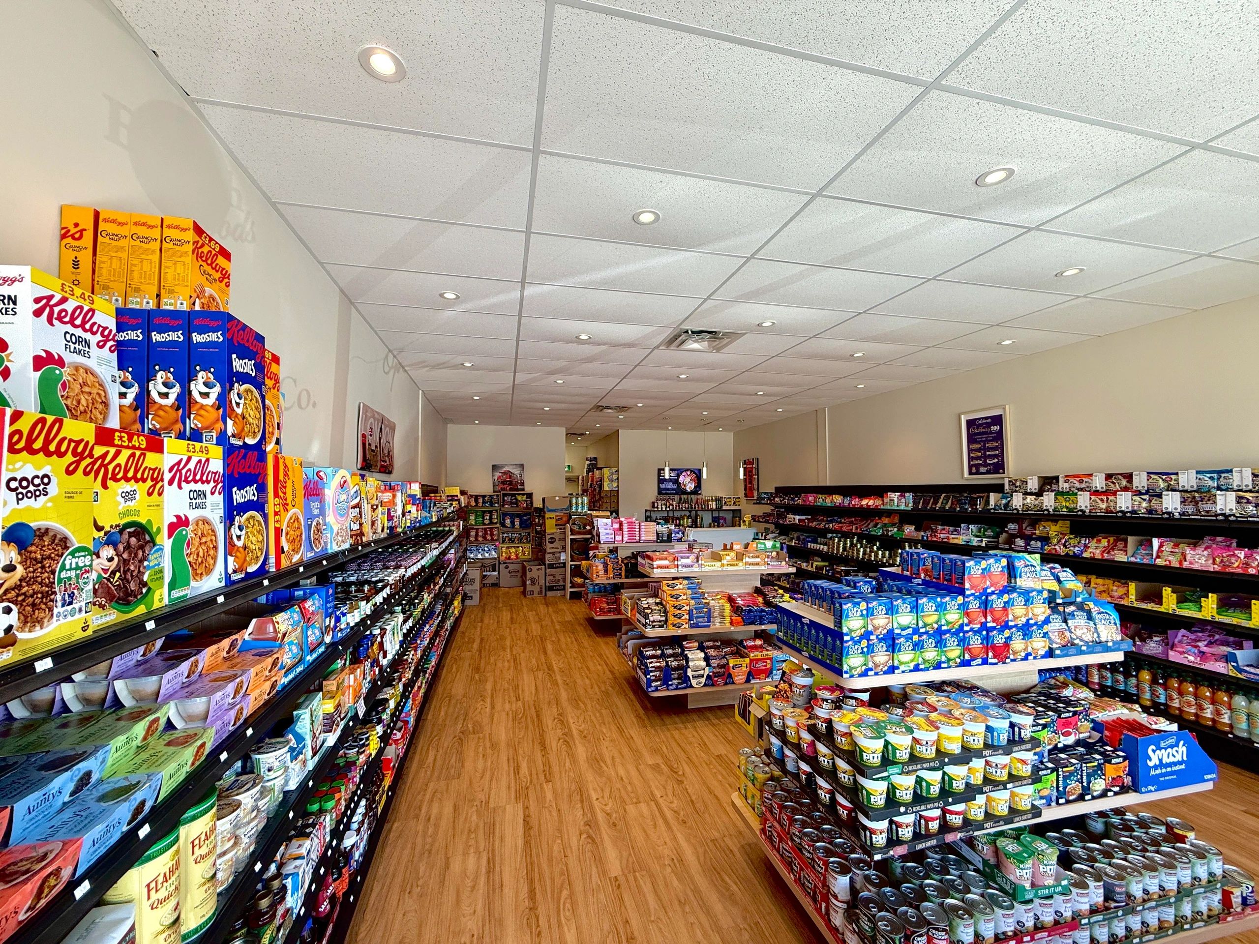 Interior of a British Food Co. store with the shelves filled with cereal, soup, biscuits, gravy, sauces, chocolates, sweets, and more all imported from the UK.