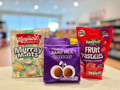 Maynards Bassetts Murray Mints, Cadbury Dairy Milk Buttons, and Rowntrees Fruit Pastilles