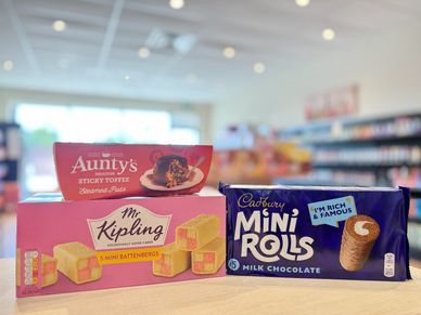 Aunty's Sticky Toffee Pudding, Cadbury Mini Rolls Milk Chocolate, and Mr Kipling Mini Battenbergs.