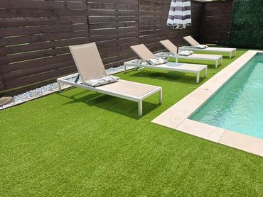 artificial turf installation around pool in league city tx