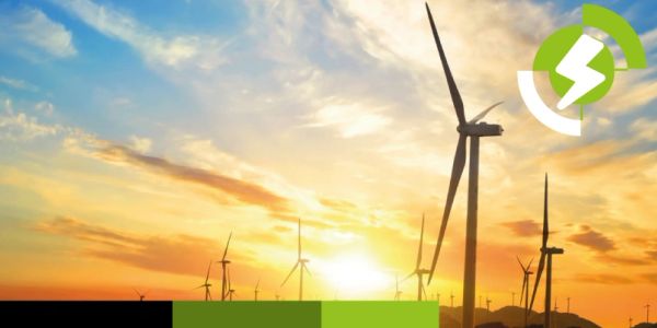 Wind turbines at sunset generating clean energy.
