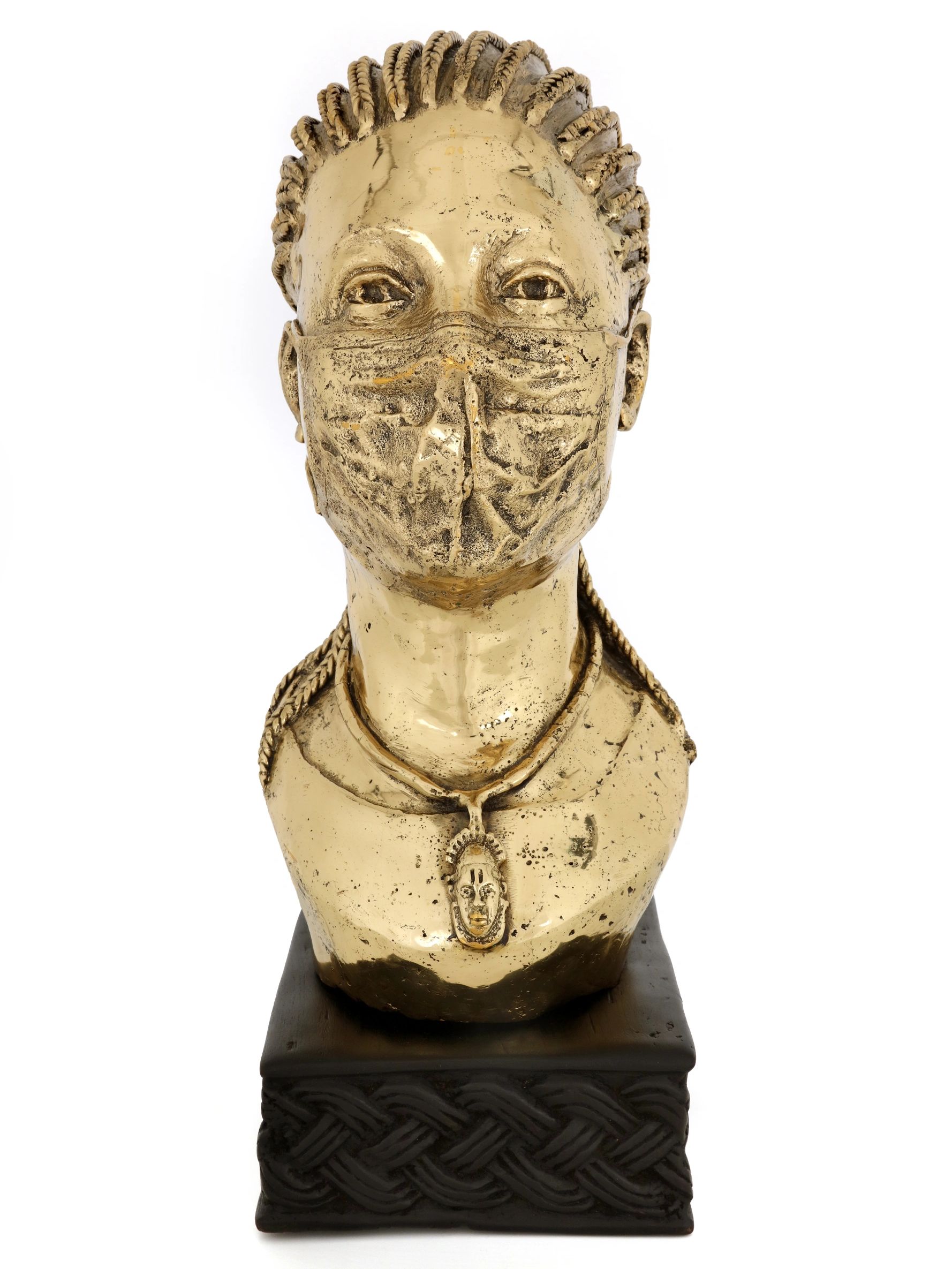 Benin bronze: masked head blends heritage with COVID-era struggles, symbolizing freedom and silence