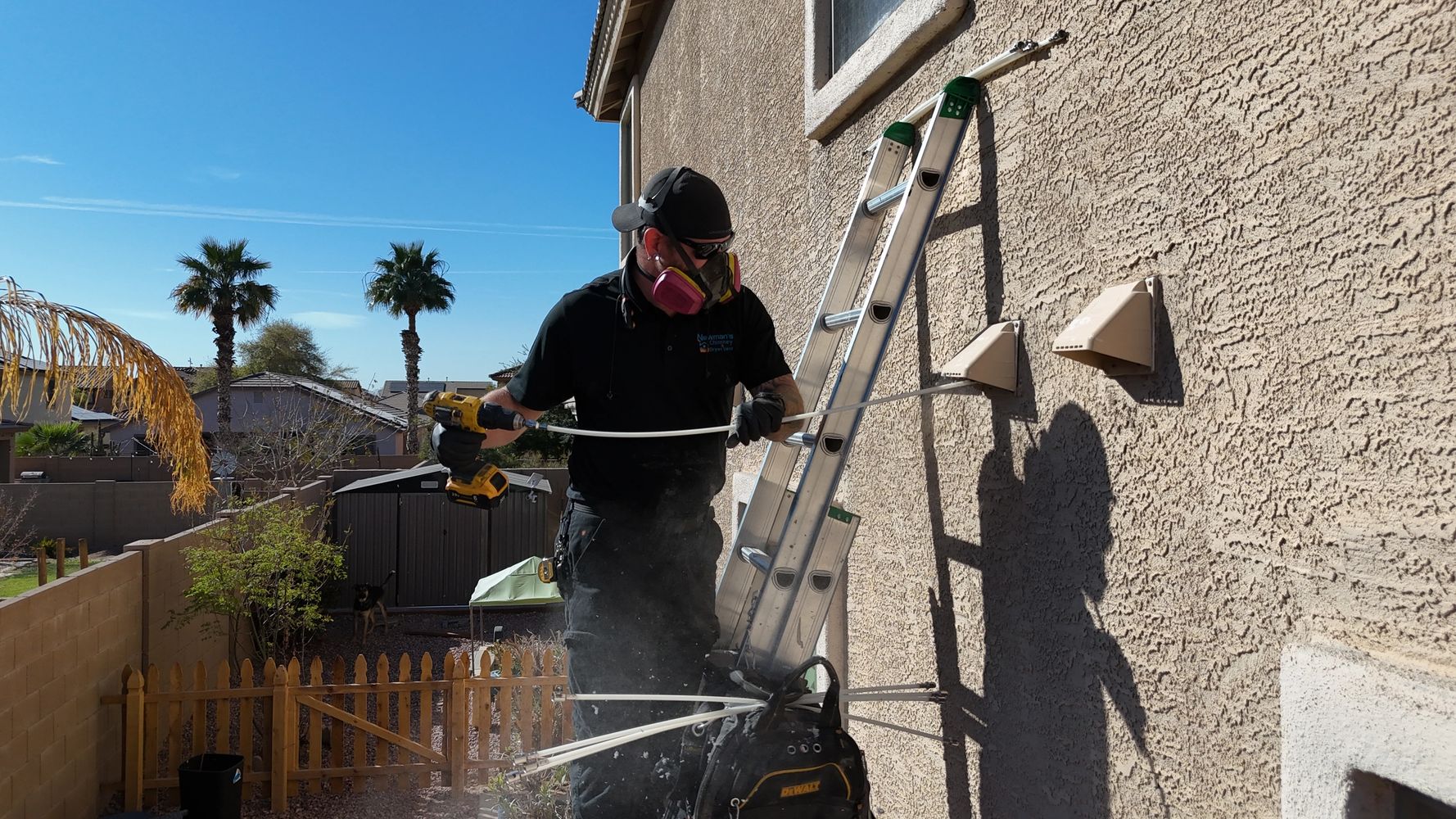NFI and CSIA certified technician cleaning a residential dryer vent in Pensacola
