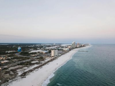 Aerial view of high-rise condos along Gulf Shores and Orange Beach corridors on Alabama's Gulf Coast