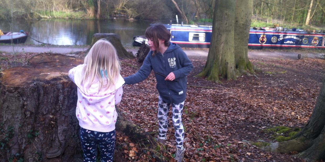 kids playing by canal