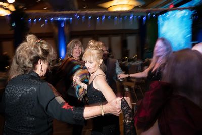 Ladies dancing to the Gala music.