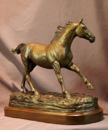 Freedom bronze statue of a Thoroughbred stallion by Kim Corpany