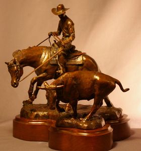 bronze horse statue reined cowhorse cowboy and cow
