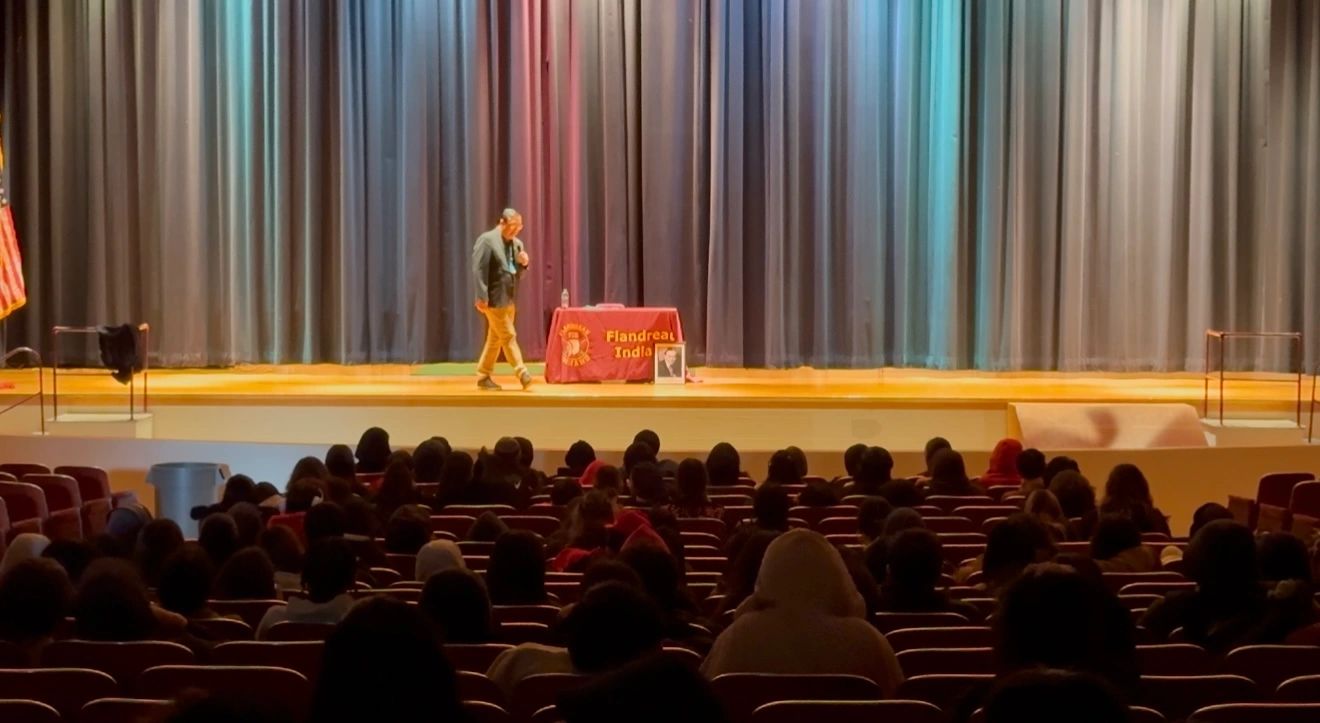 Brian Yazzie entertaining an audience
