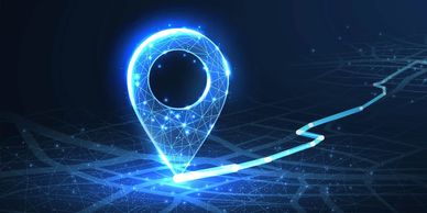 Digital map with glowing location pin and route.