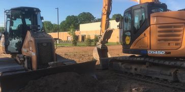 This was a lot that we graded and also fixed the pond in the back