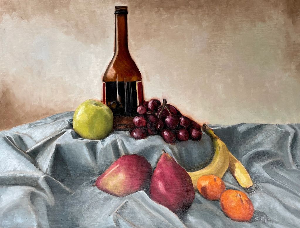 Still life of fruit and beer bottle 