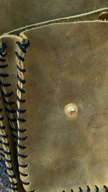 Tan custom leather bag. Dual pocket.