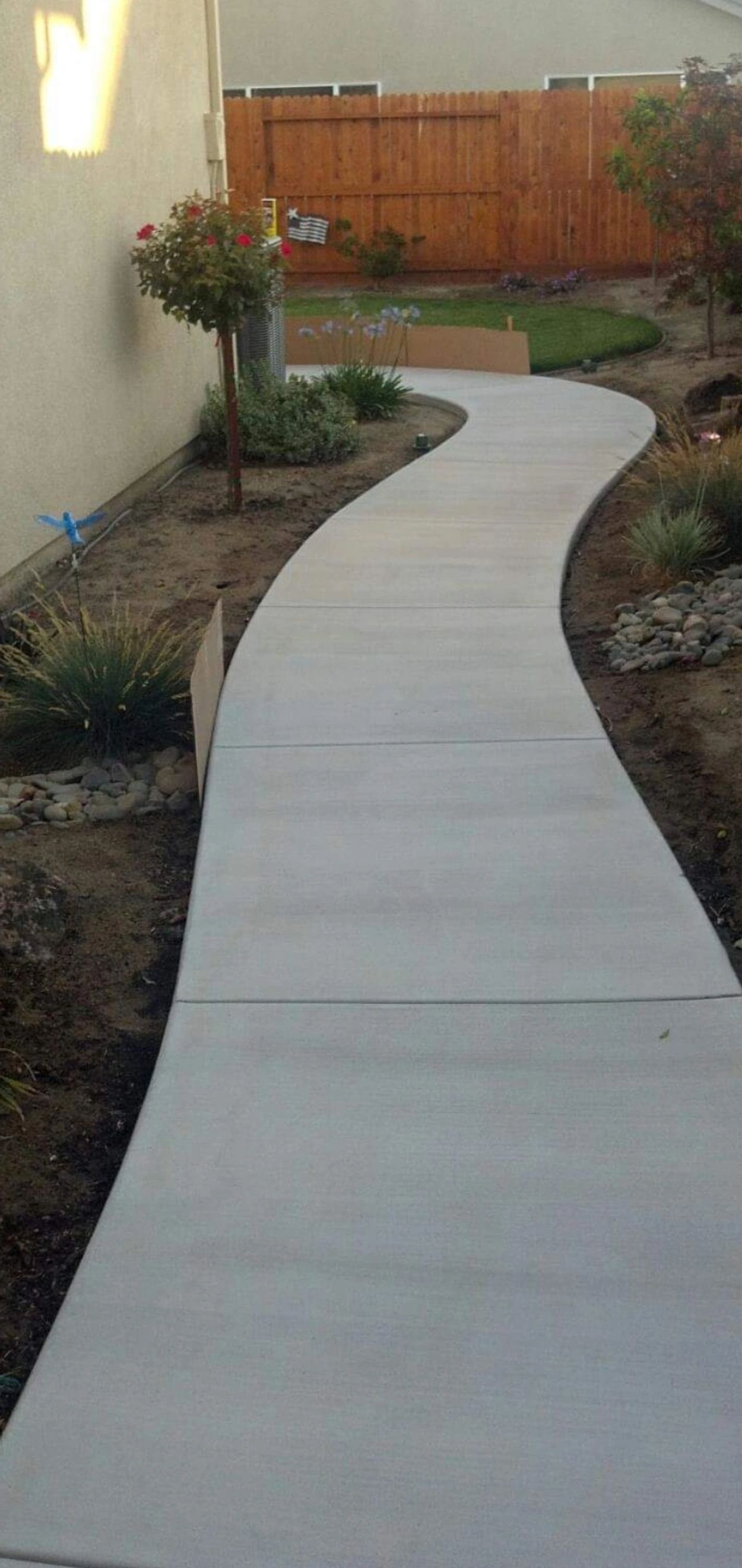 Landscaping and walkway  prior to applying acid staining.