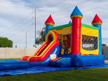 Rainbow inflatable bounce house and water slide combo for kids, teens and adults. 