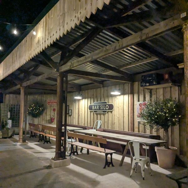 Night-time view of the train station event space, ready for an evening event at Bar Silo.