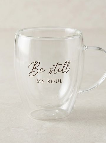 Clear glass mug with inspirational quote.