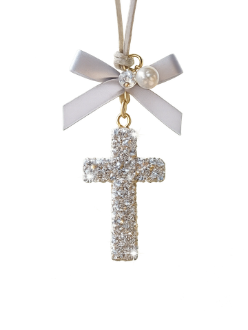 Sparkling cross pendant with a bow, pearl, and crystal charm.