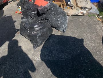 Roughly 10 regular sized garbage bags 