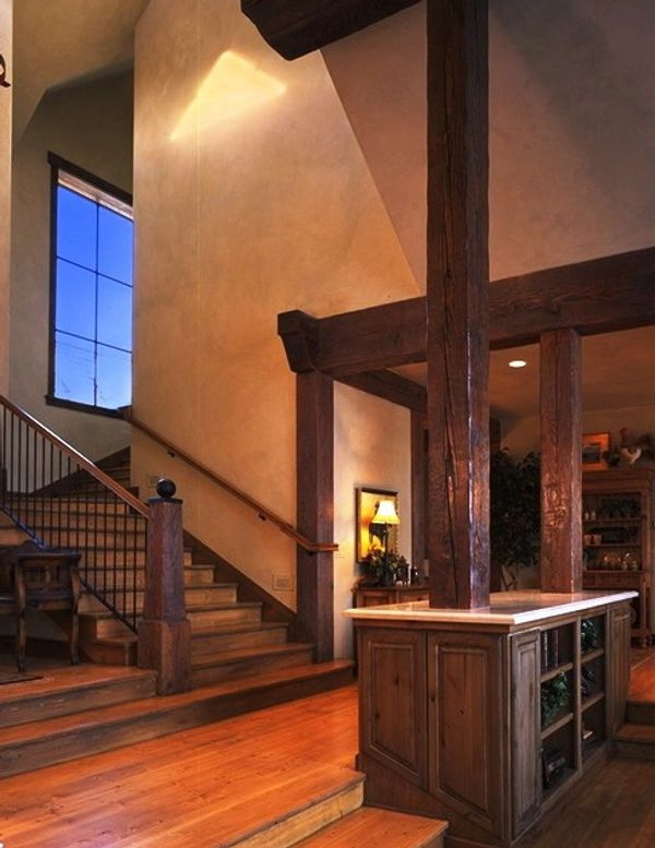 A custom mountain home designed by a colorado architect. Wide staircases move bewtween levels.