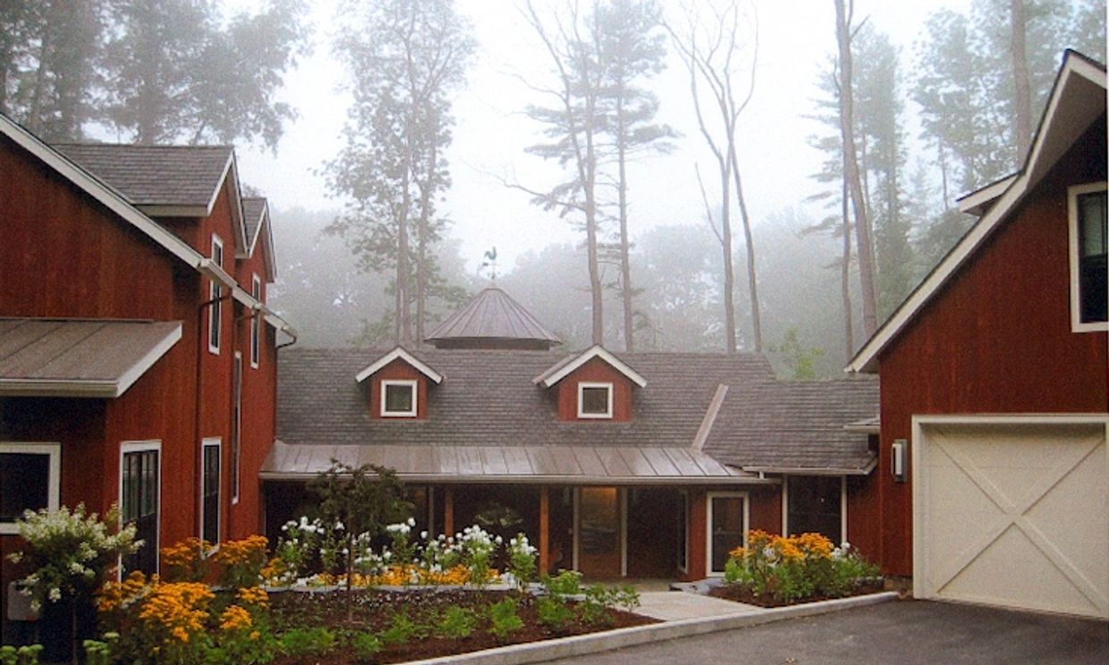 A custom farmhouse desgined by an aspen architect located in Lenox, Massachusetts.